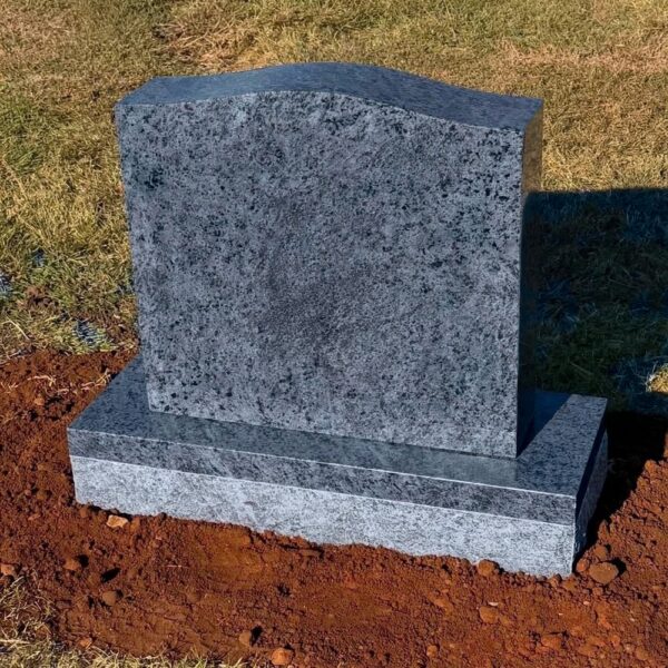 Bahama Blue granite single upright headstone installed in a cemetery